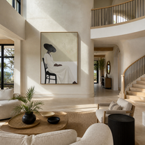 Black Brim Waits Seated - seated woman in white painting by Marcus Lau, retro modern vertical wall art – styled room scene view 3