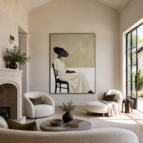 Black Brim Waits Seated - seated woman in white painting by Marcus Lau, retro modern vertical wall art – styled room scene view 5