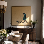 Teal Steps Stretch – Teal Coat and Dachshund painting by Hannah Brooks, minimalist figurative square wall art – styled room scene view 1