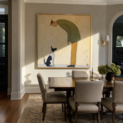 The Cat Looks Up – Green Figure and Cat painting by Hannah Brooks, minimalist figurative square wall art – styled room scene view 1