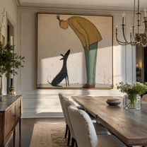 Black Ears Listen – Yellow Sweater and Black Dog painting by Hannah Brooks, minimalist figurative square wall art – styled room scene view 2