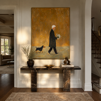 Ochre Evening Carries Flowers – Ochre Flower Bearer and Dog painting by Hannah Brooks, minimalist figurative vertical wall art – styled room scene view 4