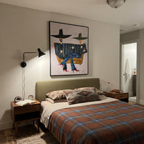 Star Coats Share Bench - seated star figure painting by Elliot Vale, modern figurative vertical wall art – styled room scene view 5