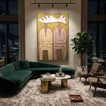 Pink Coats Share Antler - antler hat figure pair painting by Elliot Vale, modern figurative vertical wall art - styled room scene view 4