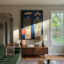 Blue Wall Holds Travelers - modern traveler pair painting by Elliot Vale, modern figurative vertical wall art - styled room scene view 3
