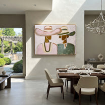 Pink Hat Meets Green - pastel hat figure pair painting by Elliot Vale, modern figurative horizontal wall art - styled room scene view 2