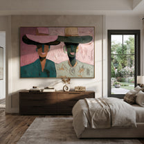 Pink Brims Frame Smiles - smiling hat figure pair painting by Elliot Vale, modern figurative horizontal wall art - styled room scene view 3