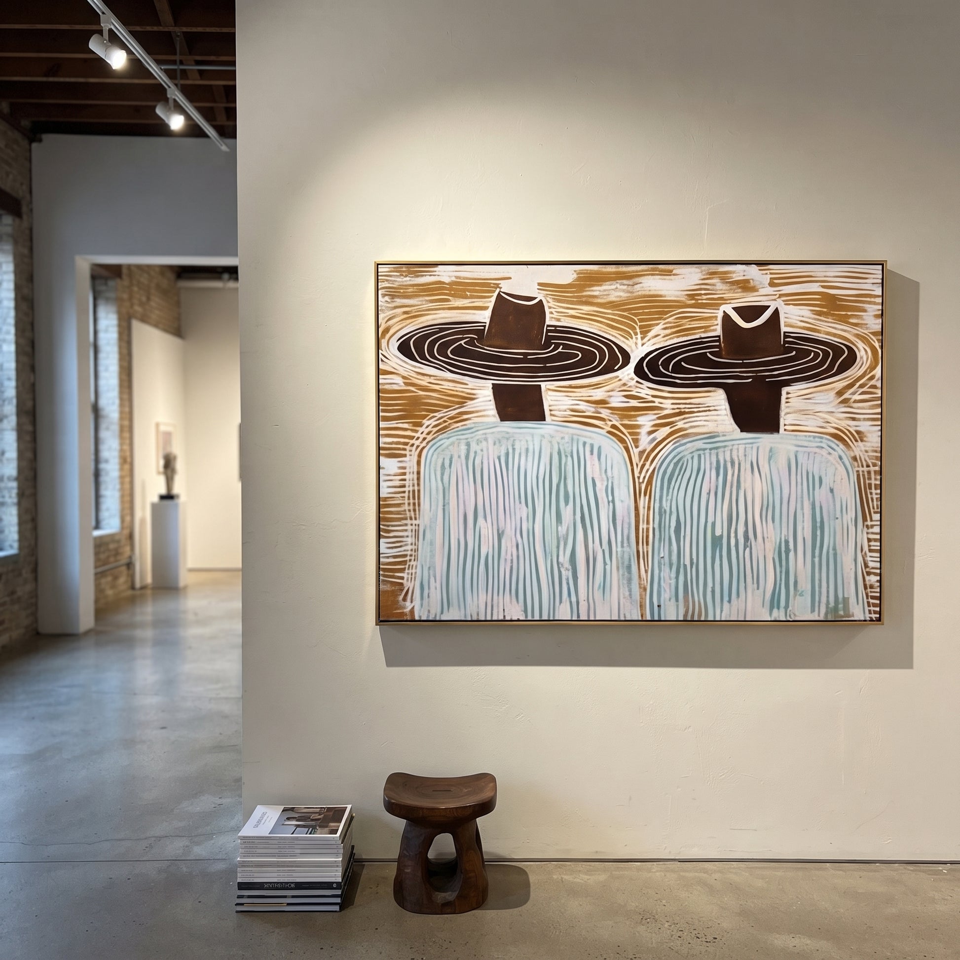 Brown Hats Cross Currents - wide hat figure pair painting by Elliot Vale, modern figurative horizontal wall art - styled room scene view 4