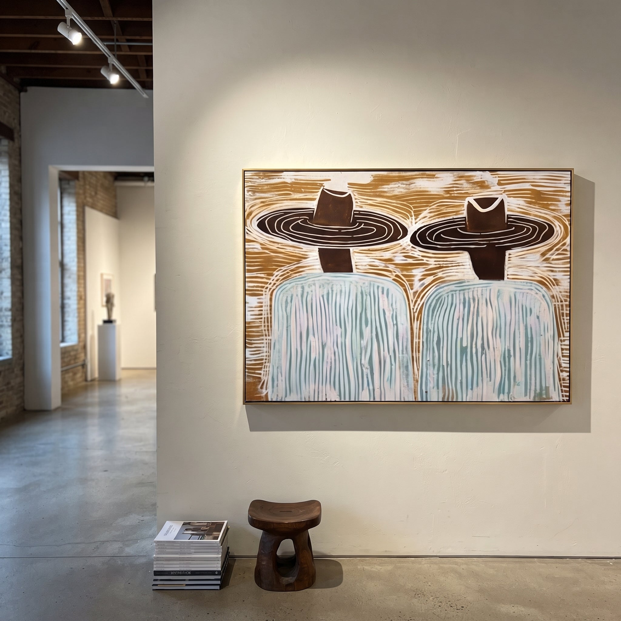 Brown Hats Cross Currents - wide hat figure pair painting by Elliot Vale, modern figurative horizontal wall art - styled room scene view 4