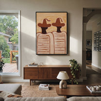 Brown Hats Hold Lines - minimal striped figure pair painting by Elliot Vale, modern figurative vertical wall art - styled room scene view 3