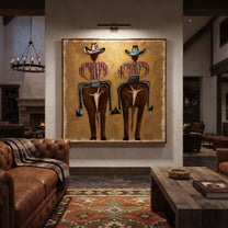Two Figures Wear Saddles - surreal western figure pair painting by Elliot Vale, modern figurative square wall art - styled room scene view 5