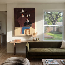 Mauve Figure Watches Blue - seated western figure pair painting by Elliot Vale, modern figurative vertical wall art - styled room scene view 2