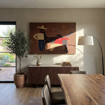 Three Shadows Share Rope - cowboy horse companion painting by Elliot Vale, modern figurative horizontal wall art - styled room scene view 5
