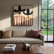 Black Hats Frame Pink - pink striped figure pair painting by Elliot Vale, modern figurative square wall art - styled room scene view 3