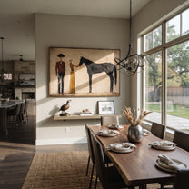 Gentle Hand Meets Horse - horse handler couple painting by Elliot Vale, modern figurative horizontal wall art - styled room scene view 5