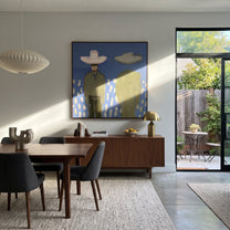 Green Shadow Follows Cowboy - cowboy shadow portrait painting by Elliot Vale, modern figurative square wall art - styled room scene view 5