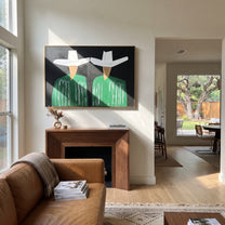 White Geometry Guards Green - geometric hat figure pair painting by Elliot Vale, modern figurative horizontal wall art - styled room scene view 4