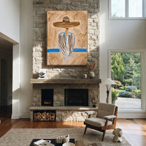 Blue Stripes Meet Sand - blue striped sombrero figure painting by Elliot Vale, modern figurative vertical wall art - styled room scene view 5