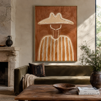 Pale Brim Crosses Clay - clay striped cowboy figure painting by Elliot Vale, modern figurative vertical wall art - styled room scene view 2