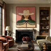 White Hat Guards Curls - green cape cowgirl painting by Elliot Vale, modern figurative square wall art - styled room scene view 1