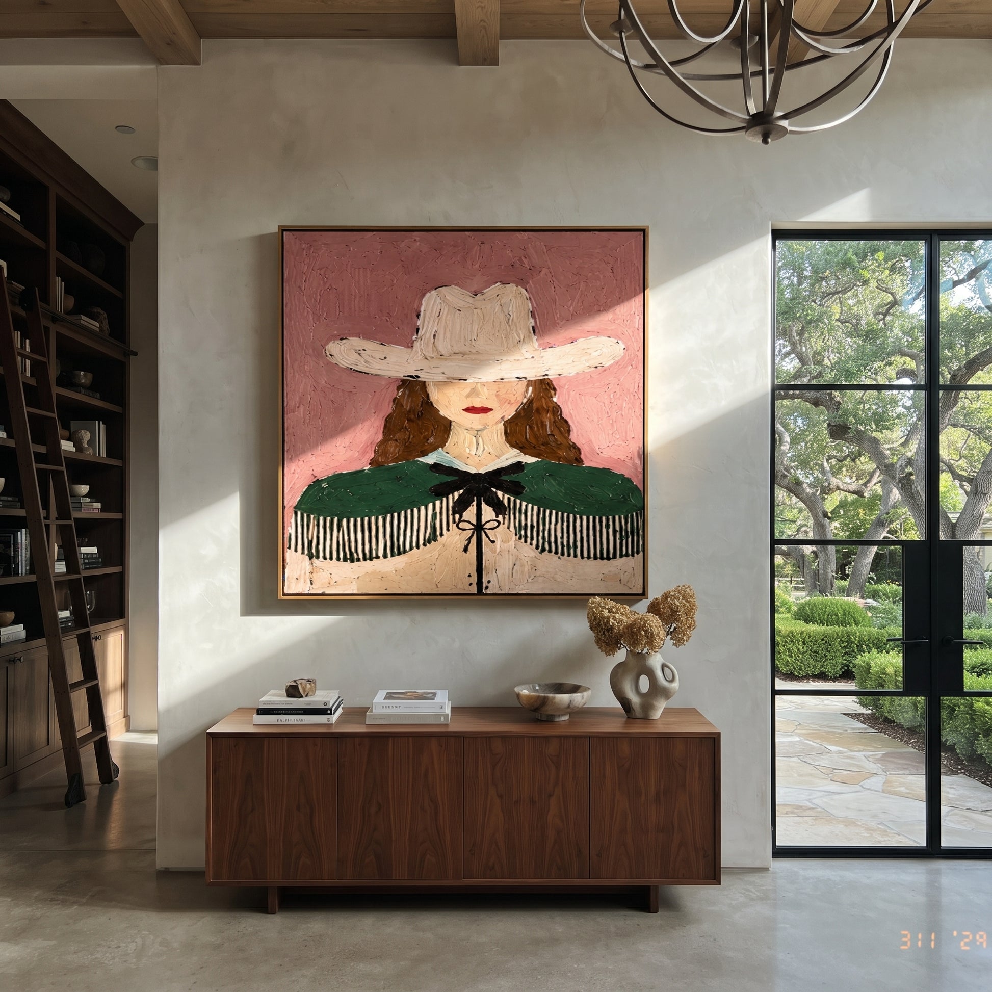 White Hat Guards Curls - green cape cowgirl painting by Elliot Vale, modern figurative square wall art - styled room scene view 2