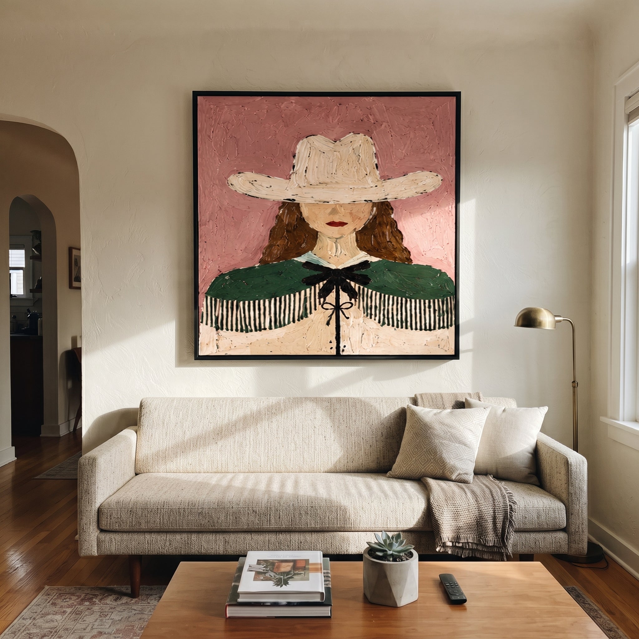 White Hat Guards Curls - green cape cowgirl painting by Elliot Vale, modern figurative square wall art - styled room scene view 3