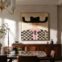 Checkered Fields Hold Pink - checkered cowgirl portrait painting by Elliot Vale, modern figurative square wall art - styled room scene view 2