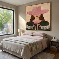 Pink Hat Frames Curls - pink green cowgirl portrait painting by Elliot Vale, modern figurative square wall art - styled room scene view 3