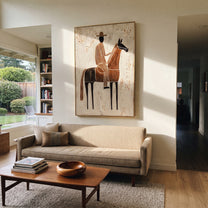 Striped Rider Crosses Ivory - brown horse rider painting by Elliot Vale, modern figurative vertical wall art - styled room scene view 5