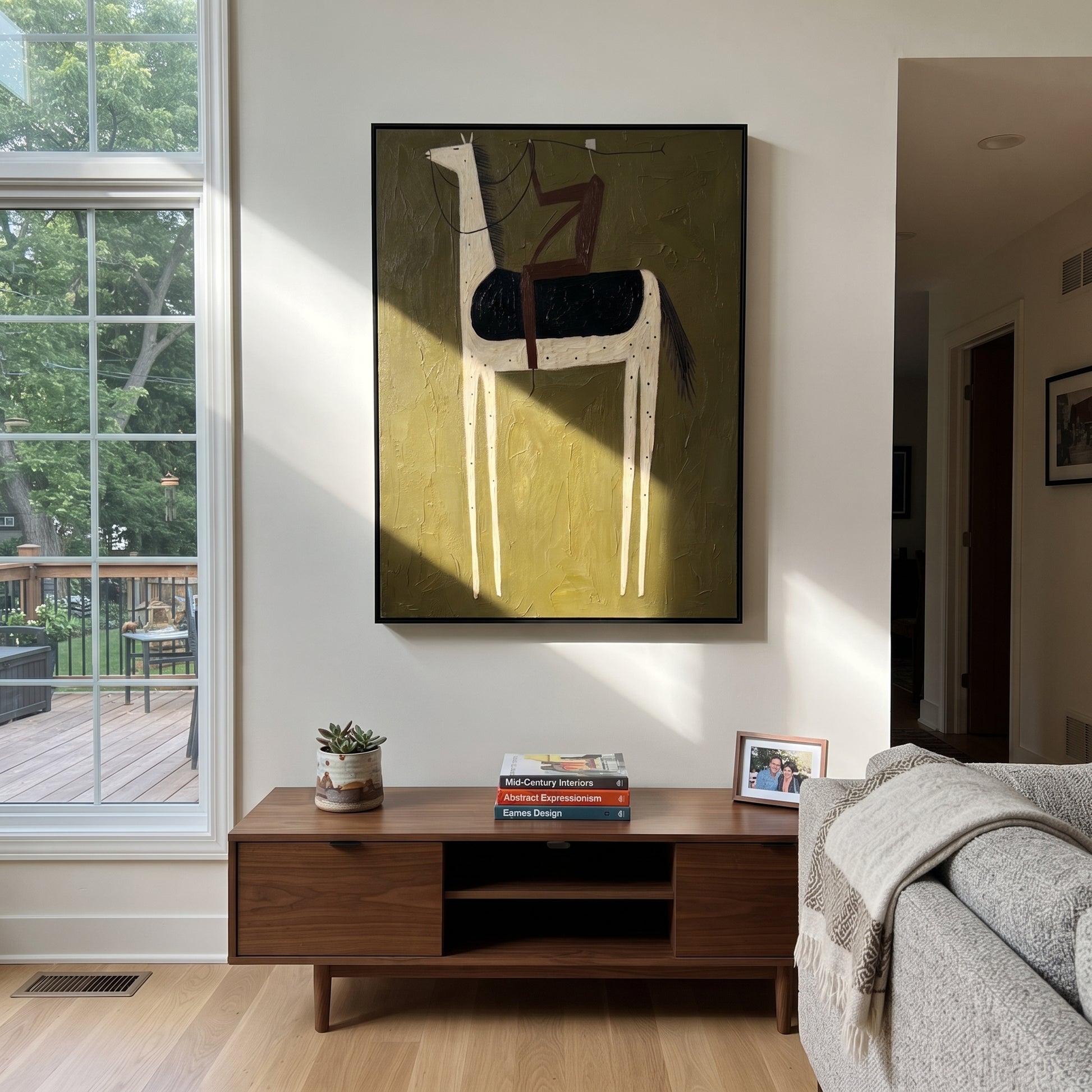 Pale Horse Carries Wine - minimal white horse rider painting by Elliot Vale, modern figurative vertical wall art - styled room scene view 5