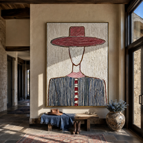 Wine Brim Meets White - blue striped hat figure painting by Elliot Vale, modern figurative vertical wall art - styled room scene view 2