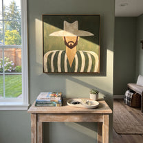 White Hat Frames Beard - bearded striped man painting by Elliot Vale, modern figurative square wall art - styled room scene view 2