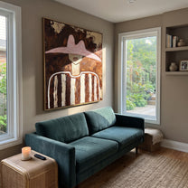 Rose Hat Meets Umber - brown striped figure painting by Elliot Vale, modern figurative square wall art - styled room scene view 3