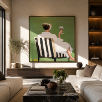 Raised Glass Meets Green - seated wine woman painting by Elliot Vale, modern figurative square wall art - styled room scene view 2