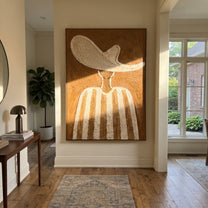 Ivory Wave Shelters Sand - neutral striped hat figure painting by Elliot Vale, modern figurative vertical wall art - styled room scene view 5