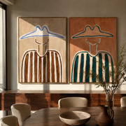 Twin Outlines Hold Stripes - outlined cowboy portrait by Elliot Vale, modern figurative set of 2 wall art - styled room scene view 1