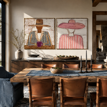 Quiet Cups Meet Brims - seated cup figures by Elliot Vale, modern figurative set of 2 wall art - styled room scene view 3
