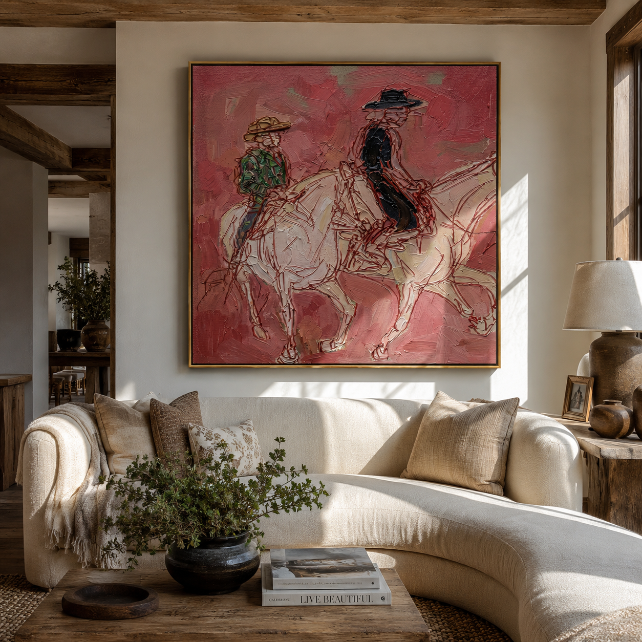 Rose Dust Carries Two Riders - pink horseback pair painting by Ethan Mercer, contemporary western square wall art – styled room scene view 5