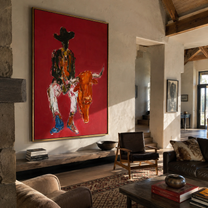 Rust Horns Lower Slowly - cowboy holding longhorn painting by Ethan Mercer, contemporary Western vertical wall art – styled room scene view 3