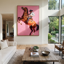 Chestnut Hooves Break Pink - rearing horse cowboy painting by Ethan Mercer, contemporary Western vertical wall art – styled room scene view 1