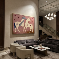 Two Cream Horses Gather - two horses folk painting by Ethan Mercer, contemporary Western horizontal wall art – styled room scene view 4