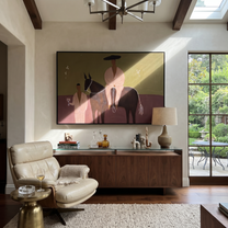 Two Figures Share Reins - horse and two figures painting by Ethan Mercer, contemporary Western horizontal wall art – styled room scene view 1