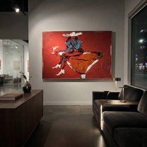 Burgundy Glass Holds Midnight - seated cowgirl martini portrait by Ethan Mercer, contemporary Western horizontal wall art – styled room scene view 2