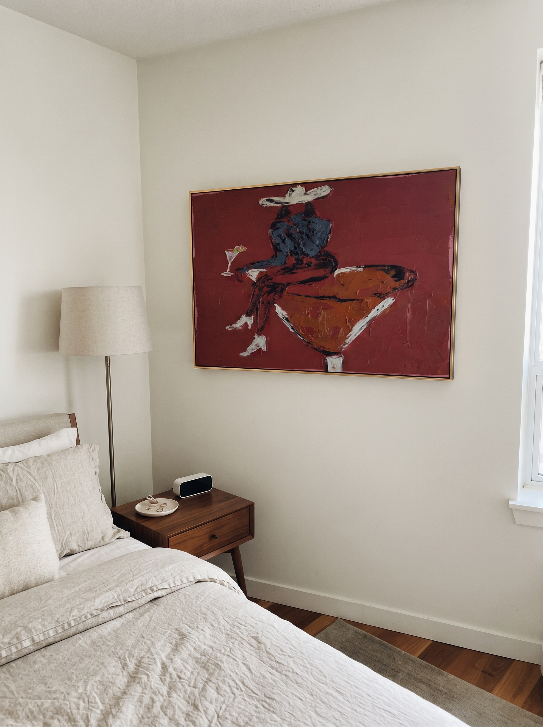 Burgundy Glass Holds Midnight - seated cowgirl martini portrait by Ethan Mercer, contemporary Western horizontal wall art – styled room scene view 7