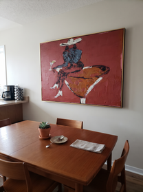 Burgundy Glass Holds Midnight - seated cowgirl martini portrait by Ethan Mercer, contemporary Western horizontal wall art – styled room scene view 8