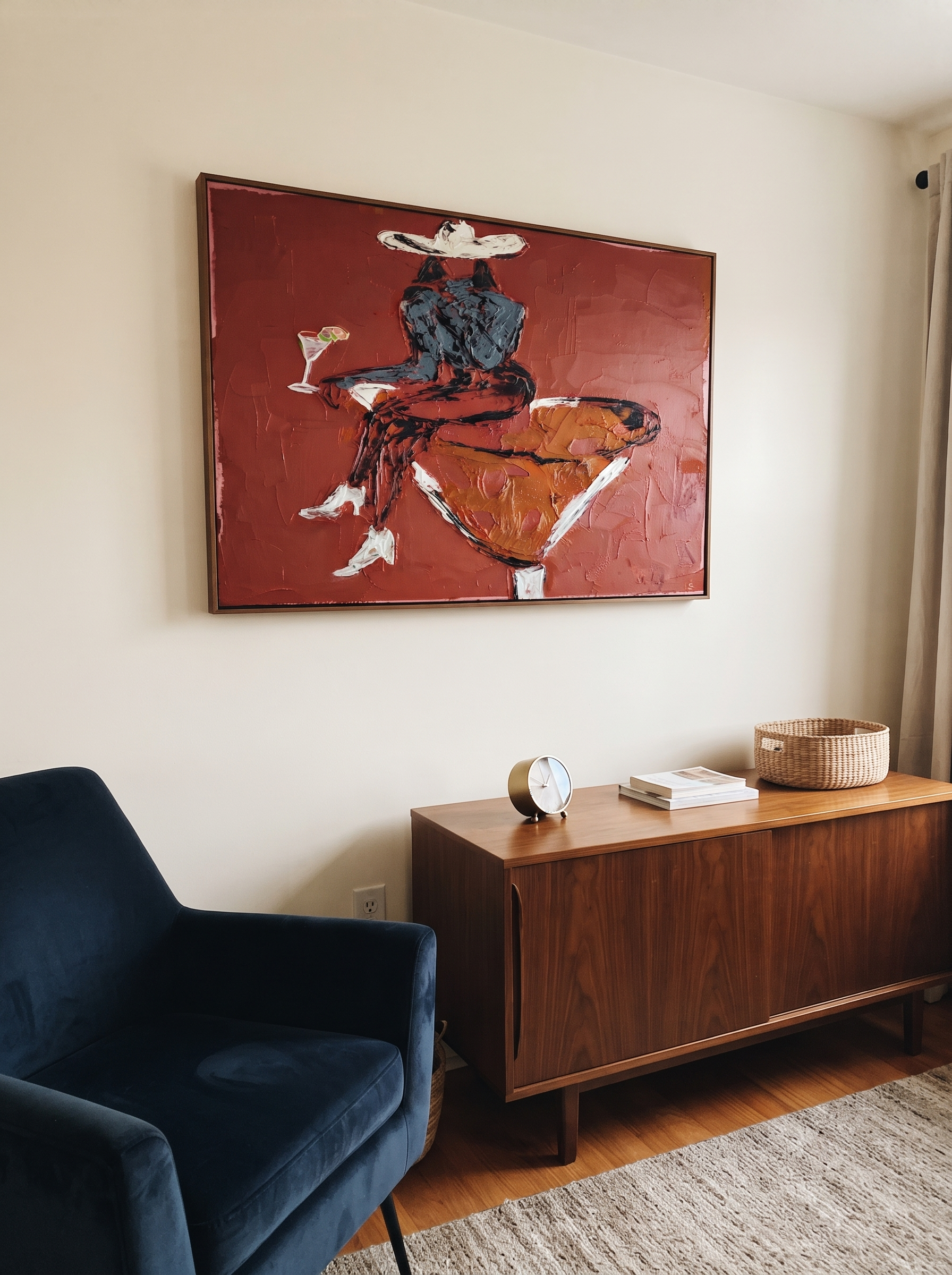 Burgundy Glass Holds Midnight - seated cowgirl martini portrait by Ethan Mercer, contemporary Western horizontal wall art – styled room scene view 9