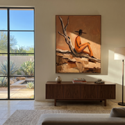 Deadwood Keeps His Counsel - solitary cowboy landscape painting by Ethan Mercer, contemporary Western vertical wall art – styled room scene view 1