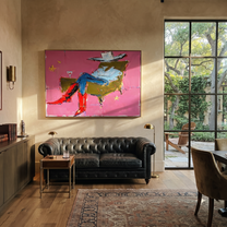 Red Boots Recline Westward - modern reclining cowboy painting by Ethan Mercer, contemporary Western horizontal wall art – styled room scene view 1