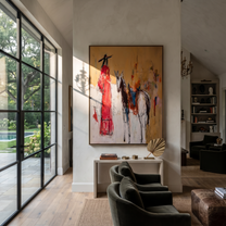 Scarlet Figure Follows Horse - abstract rider and horse painting by Ethan Mercer, contemporary Western vertical wall art – styled room scene view 3