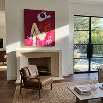 Scarlet Shirt Hides Stars - reclining cowgirl portrait painting by Ethan Mercer, contemporary Western vertical wall art – styled room scene view 4